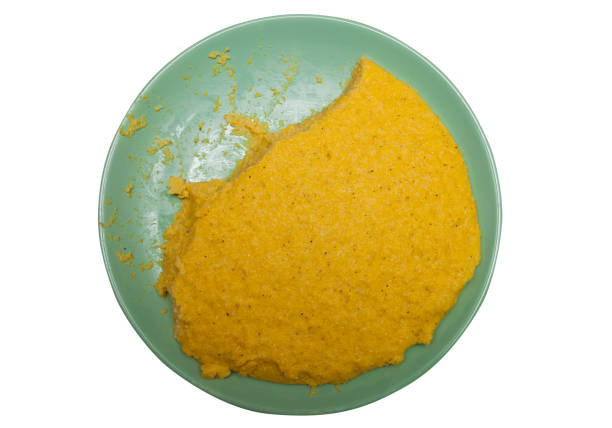 polenta or mamaliga, romanian traditional food polenta or mamaliga, romanian traditional food from corn flour mamaliga stock pictures, royalty-free photos & images