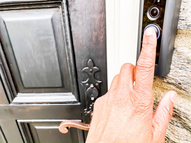 African-American Female Ringing Doorbell