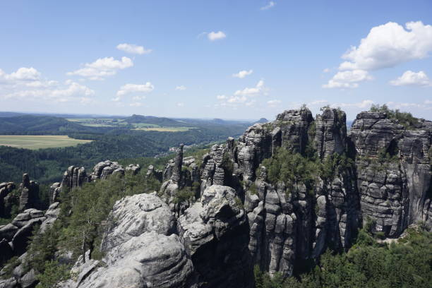 istock Main Schrammsteine rocks from the Schrammstein viewpoint in Saxon Switzerland 1201275913