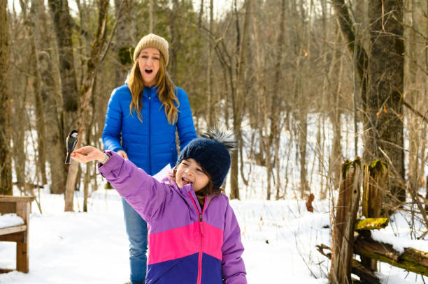 istock Mother and daughter bonding in nature 1201276737