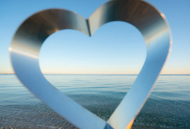 istock Heart shape on the beach, Valentine's Day 1201276850