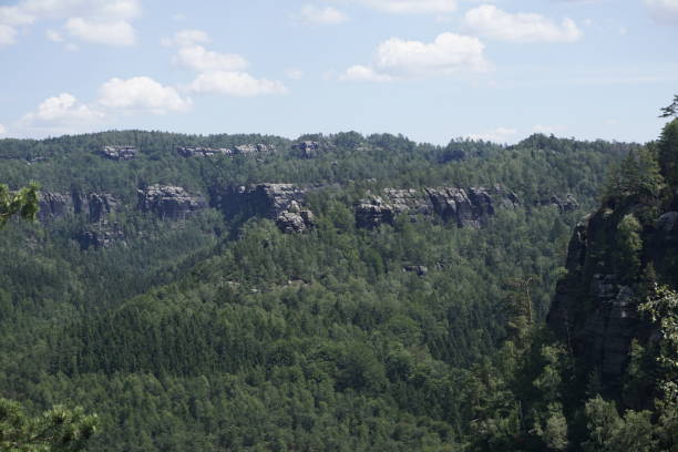 istock Beautiful forest and rock panorama from the Schrammsteine mountains 1201277432