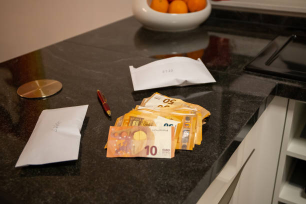 istock Bundle of money, euro notes and envelopes 1201279980