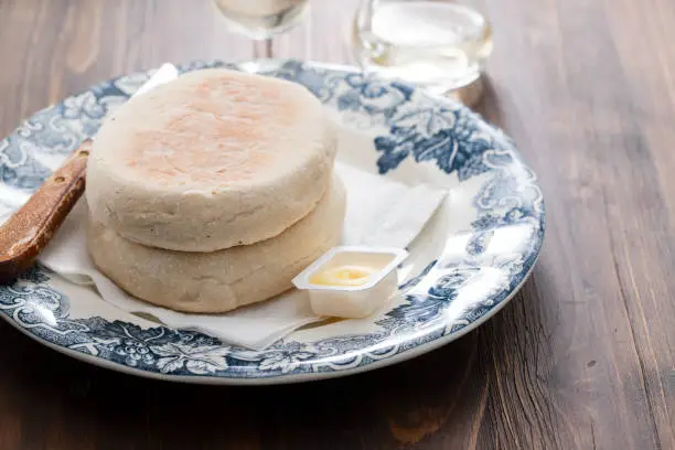 typical portuguese bread of Madeira Bolo do caco with butter