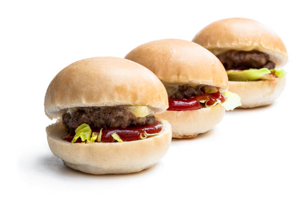 istock Set of three mini hamburgers isolated on white background 1201280450