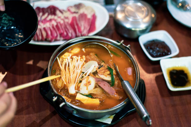 istock Korean spicy sausage stew close up 1201281528