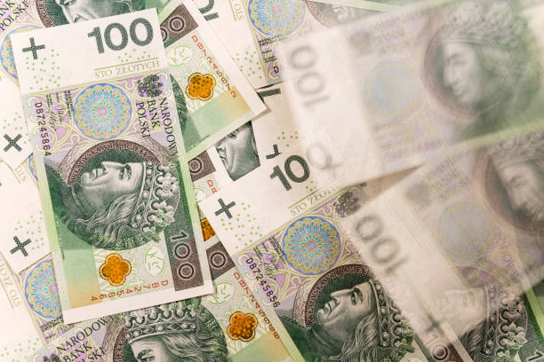 istock Polish banknotes. One hundred Zloty pile 1201283031
