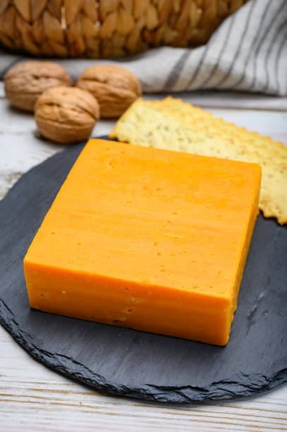 istock Leicestershire cheese or red leicester, British hard cheese made from cow milk 1201286094