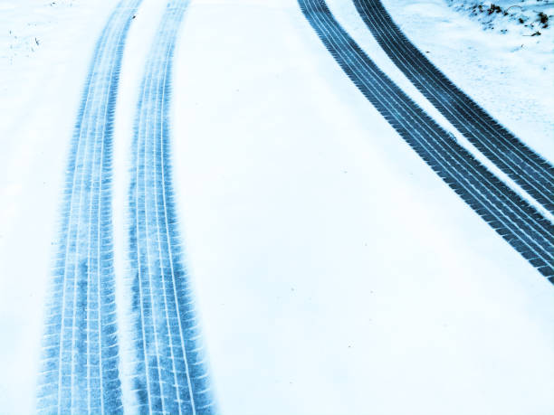 istock Fresh Tire Tracks on Fresh Snow 1201292458