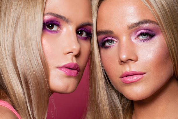istock Two beautiful female faces close up portrait 1201292507