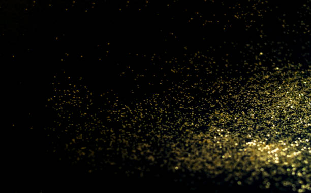 istock Black background with golden sparkles. Blurred  effect. Concept for festive background or for project.Copy space 1201292565