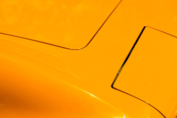 istock car design abstract  background - automobile concept orange 1201292575