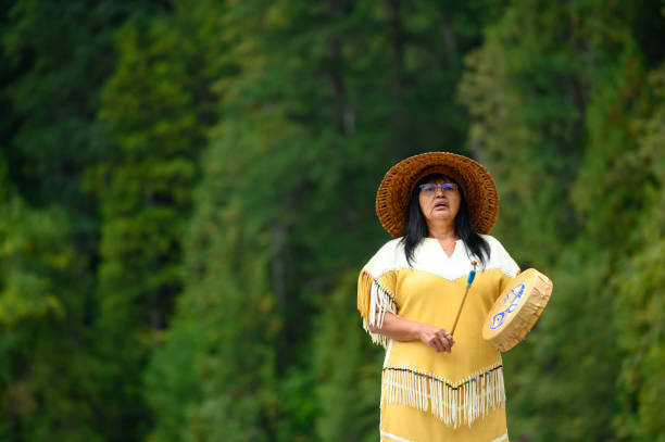 istock First Nations woman performing a welcome song 1201299437