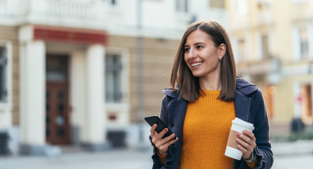 istock Texting in the city 1201300271