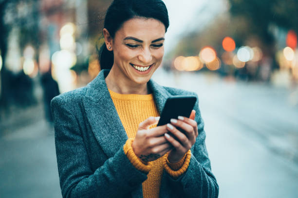 istock Texting in the city 1201300279