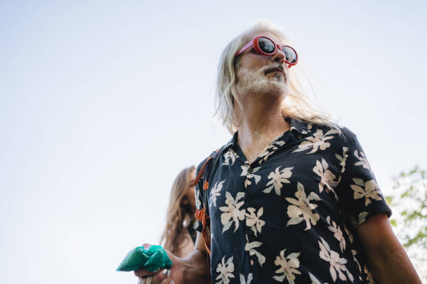 istock Cool attitude metrosexual hipster in a floral shirt 1201301034