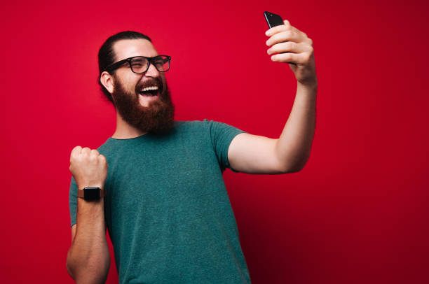 istock Excited bearded young man, about his victory 1201303953