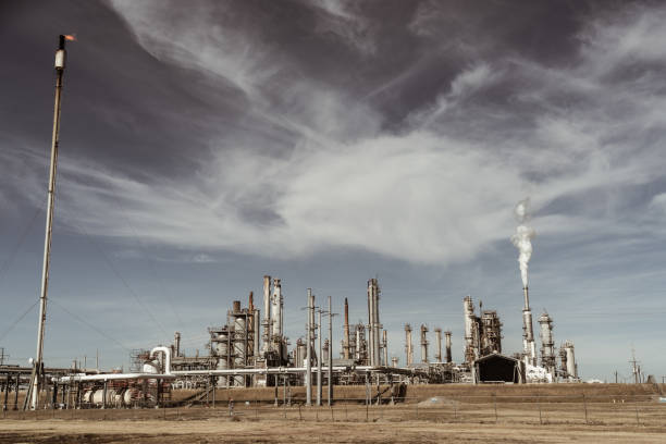 istock Huge oil refinery , human made Climate change 1201305149