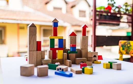 Children built a colorful castle from building blocks.
