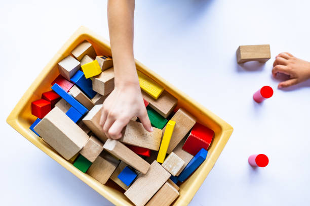 istock High angle view of a children hands playing with colorful building blocks 1201306967