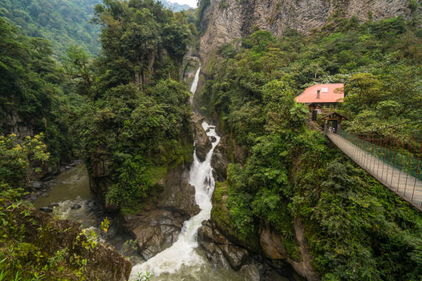 The Pailon del Diablo (Devil's Cauldron), one of the biggest waterfalls in Ecuador. Mountain river, waterfall and bridge in the Andes near Banos Ecuator.