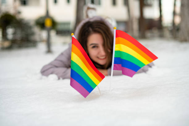 istock Defocused Brunette Woman and Rainbow Flag 1201307736