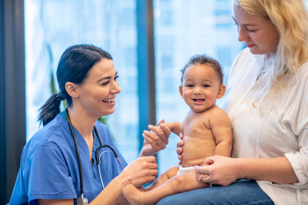 istock Mother & Son Wellness Check-Up stock photo 1201308664