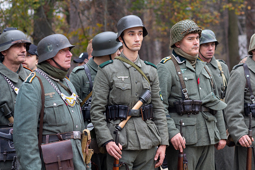 Vorzel, Ukraine - November 03, 2019: Men in the form of Wehrmacht soldiers at the festival of historical reconstruction