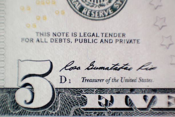 istock Fragment of five dollars bill with figure five 1201314679