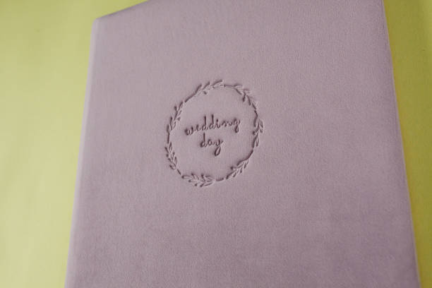 istock Inscription WEDDING DAY supplanted on velour wedding book 1201314727