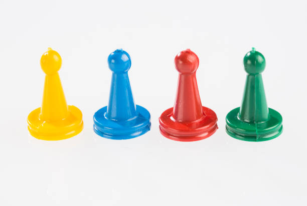 istock Colorful game pieces and dice 1201315739