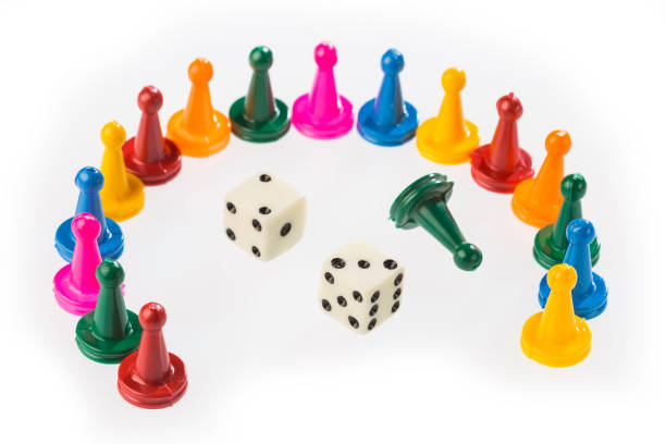 istock Colorful game pieces and dice 1201316054