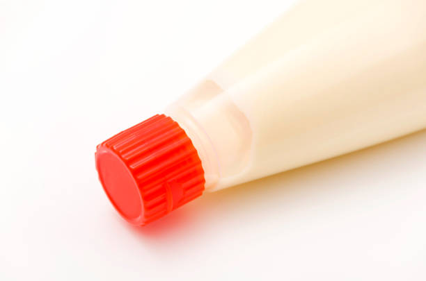 istock Bottle of mayonnaise Dressing on White Background 1201317199