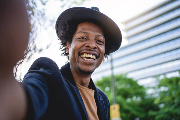 istock Beautiful cheerful African American doing a selfie 1201317272