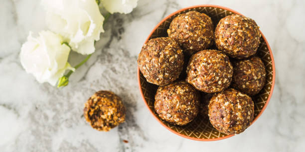 istock Energy balls with healthy ingredients on marble 1201319333