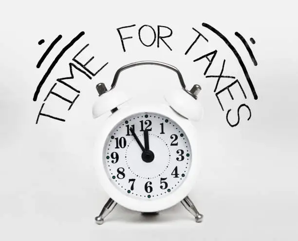 Photo of TIME FOR TAXES / Clock concept (Click for more)