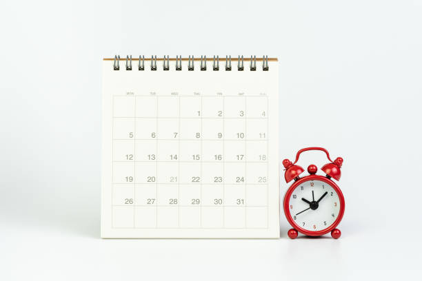 istock White clean calendar with red retro alarm clock on white background using as year plan, Busy work reminder, annual leave, project deadline or special event day concept 1201322057