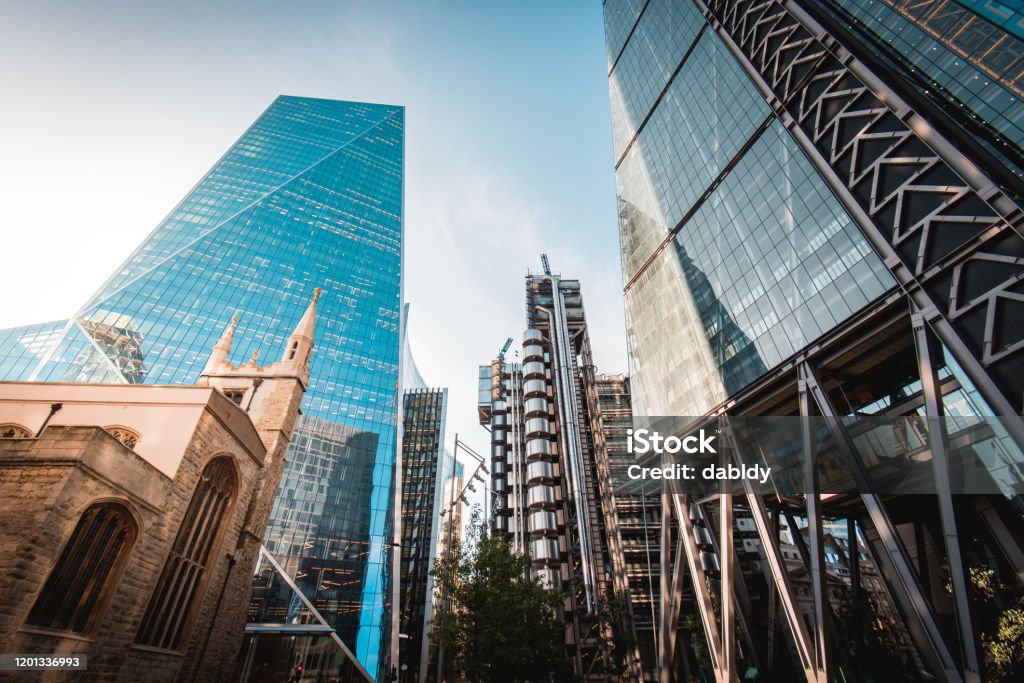 City of London Buildings View Iconic London City Buildings From left to right - St Andrew Undershaft Church, The Scalpel, Lloyd's of London, Leadenhall Building. Lloyds of London Stock Photo