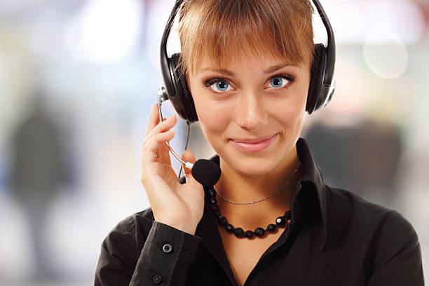 istock Support phone operator beautful young woman in headset at workplace 120134168