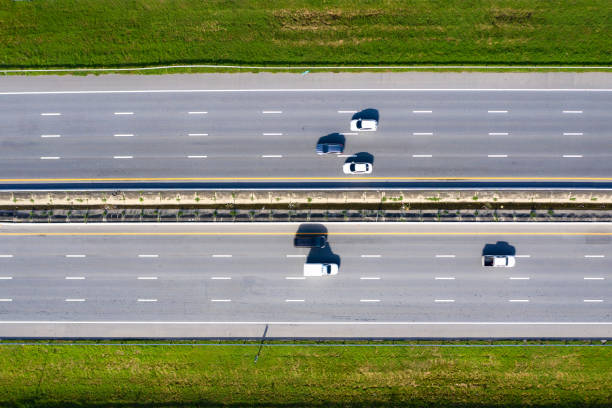 arial view of modern transportation with expressway road  highway top view. important infrastructure. - road top view imagens e fotografias de stock