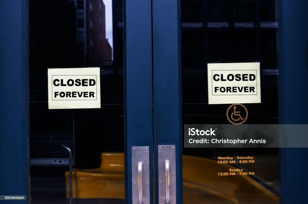 Closed Forever Business with /closed forever signs Closing Stock Photo
