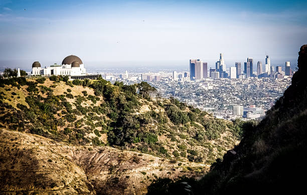 Hollywood hills trail Panoramic view of Downtown Los Angeles and Griffith Observatory from the Hollywood Hills. griffith park photos stock pictures, royalty-free photos & images