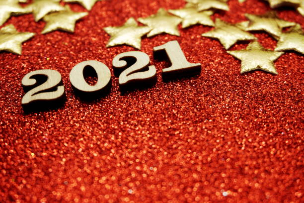 istock Happy New year 2021 with space copy on red glitter background 1201353990