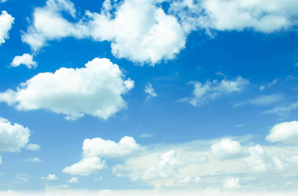istock Blue sky background and white clouds in the air. 1201356241