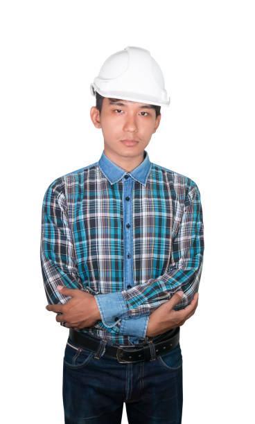 istock Engineering construction arm cross on chest  and wear white safety helmet plastic isolated on white background 1201356730