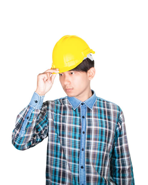 istock Engineer hand catch hold white safety helmet plastic on head. construction concept  isolated on white background 1201356784