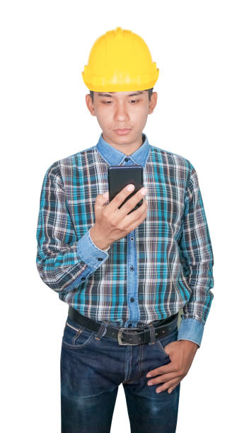istock Businessman engineer talk command with cell phone with 5g network, high-speed mobile Internet. and wear wear yellow safety helmet plastic. future  technology concept on white background 1201356813
