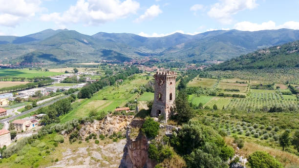 istock Tower surrounded by hills, aerial view 1201358067