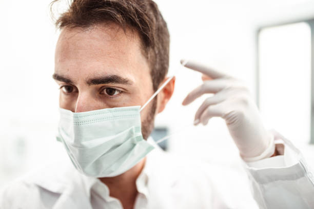 istock dentist doctor with mask 1201361065