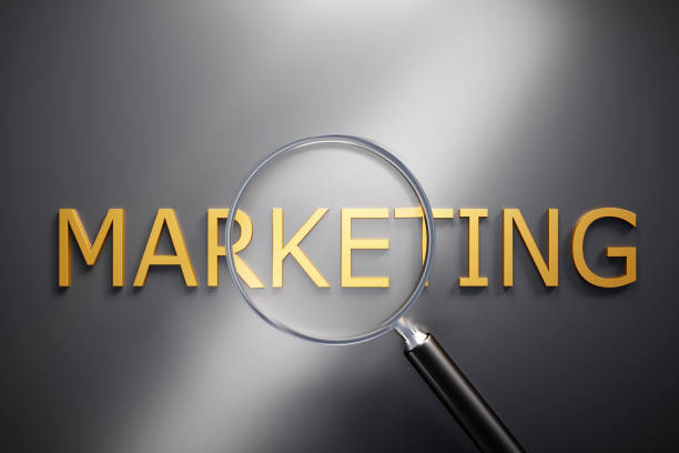 istock Magnifying Glass on Text Marketing 1201364630